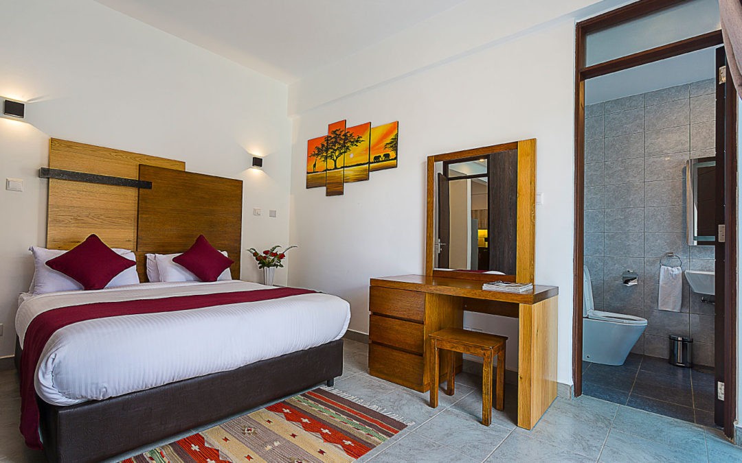 A furnished apartment bedroomvwith a workspace